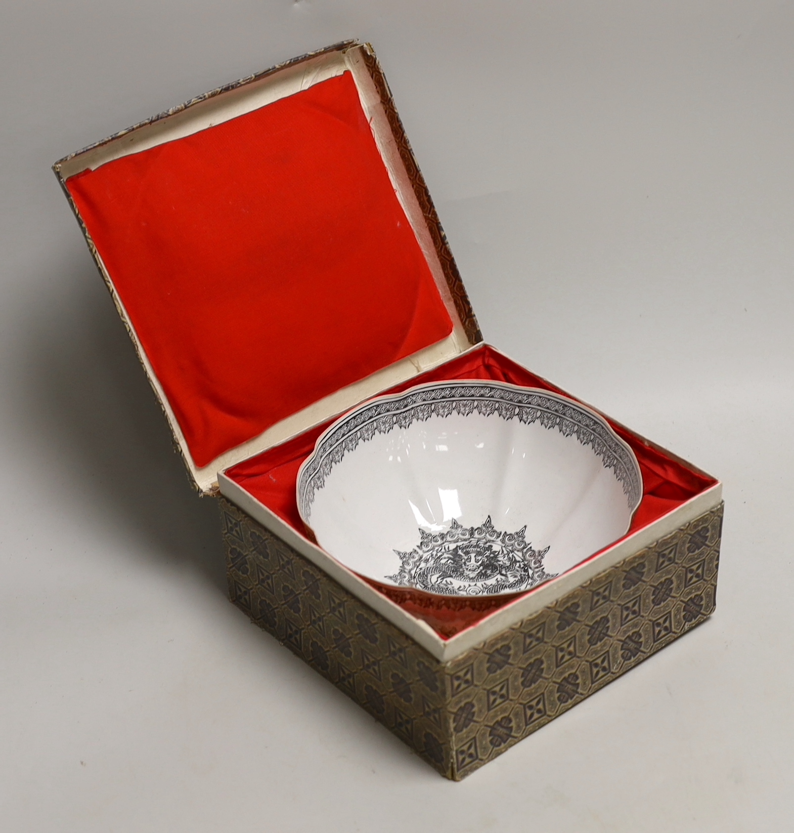 A Chinese eggshell bowl in fitted box, decorated with a mountainous landscape, 18cm in diameter